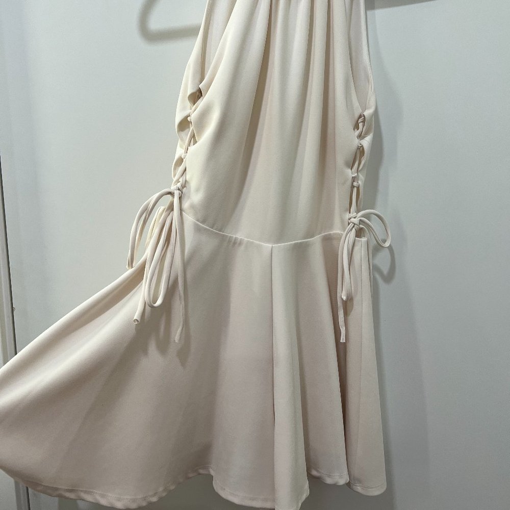 White cocktail dress with tie up sides